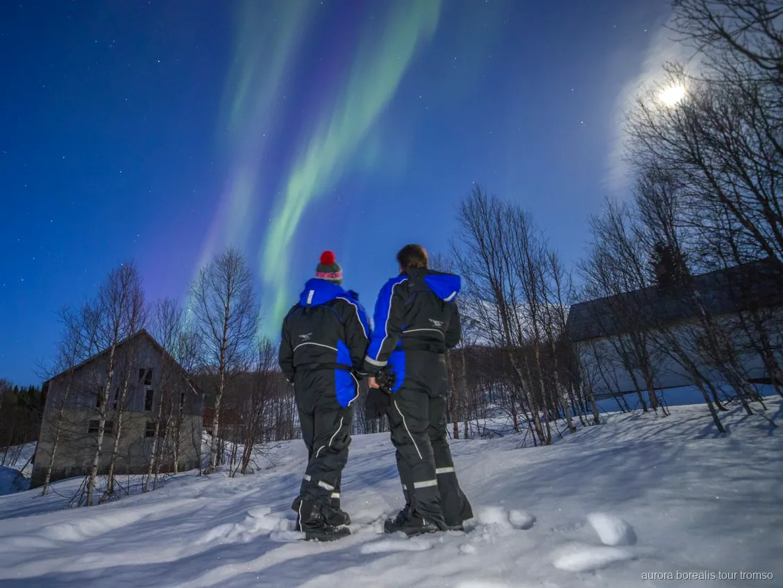 Aurora boreal vista des del campament en el tour de l'autobús panoràmic de Tromsø